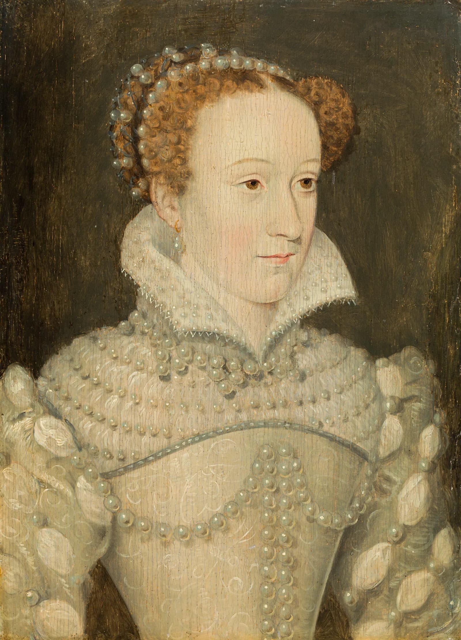 A woman with red hair wearing a pearl-studded dress and headpiece, looking to the right with a neutral expression.
