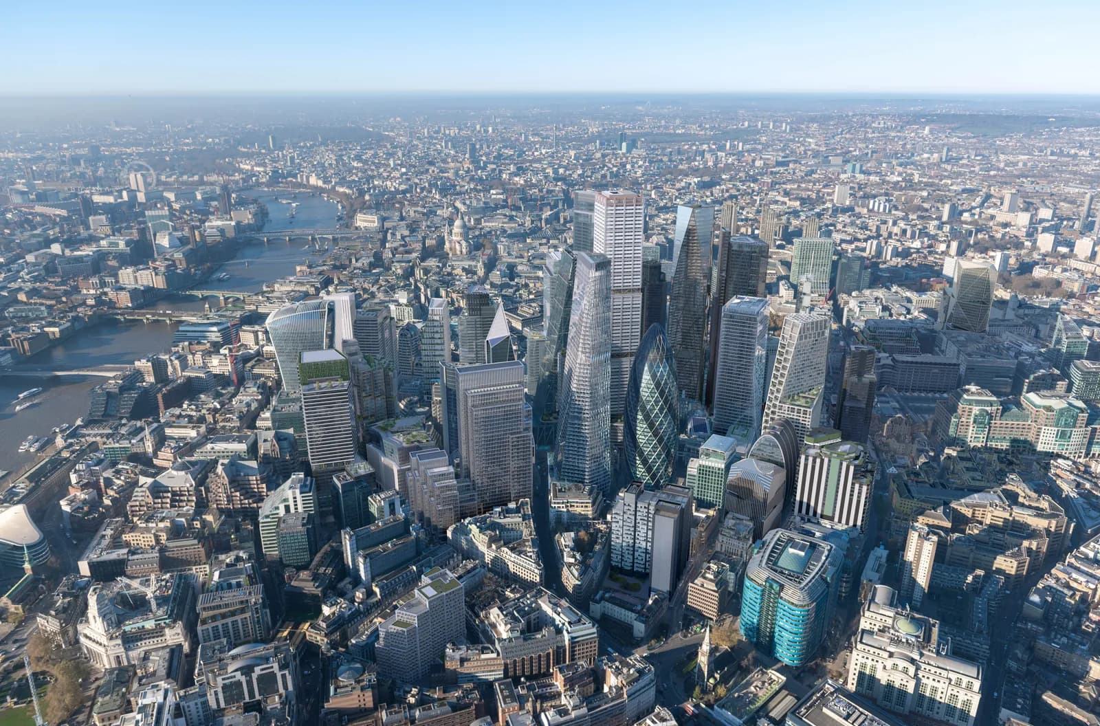 An aerial view showcases the dense urban landscape of London, with the River Thames winding through the city and numerous skyscrapers dominating the skyline under a clear blue sky.