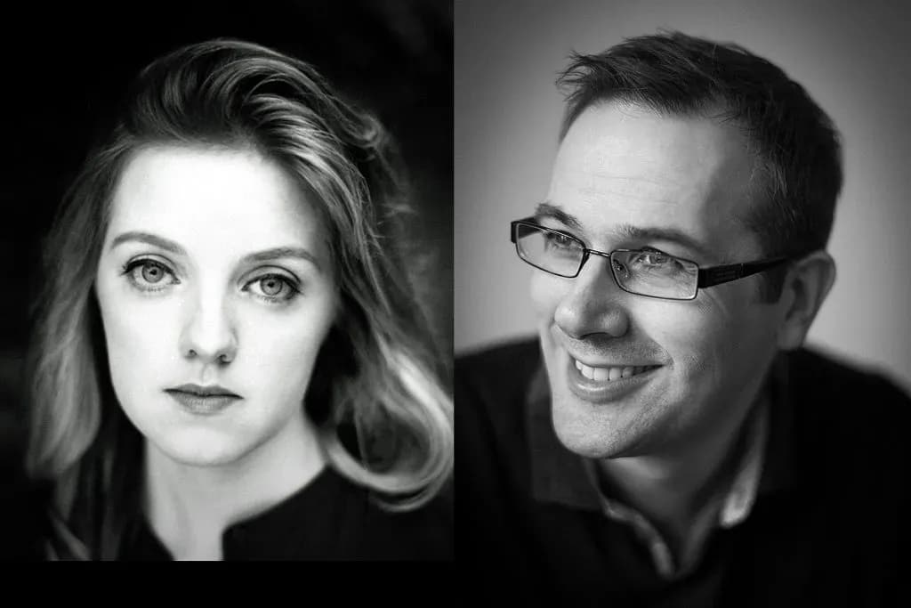 A black and white split image showing a woman on the left with long wavy hair looking straight ahead and a man on the right wearing glasses, smiling and looking to the right.